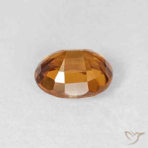 Zircon Orange foncé naturelle ovale, 1.07 ct, VS