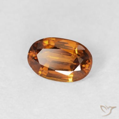 Zircon Orange foncé naturelle ovale, 0.70 ct, VS