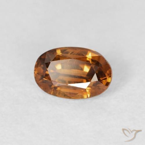 Zircon Orange brun naturelle ovale, 0.77 ct, VS