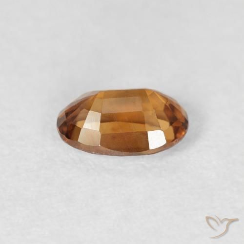 Zircon Orange brun naturelle ovale, 0.77 ct, VS