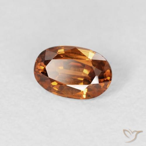 Zircon Orange foncé naturelle ovale, 0.72 ct, VS