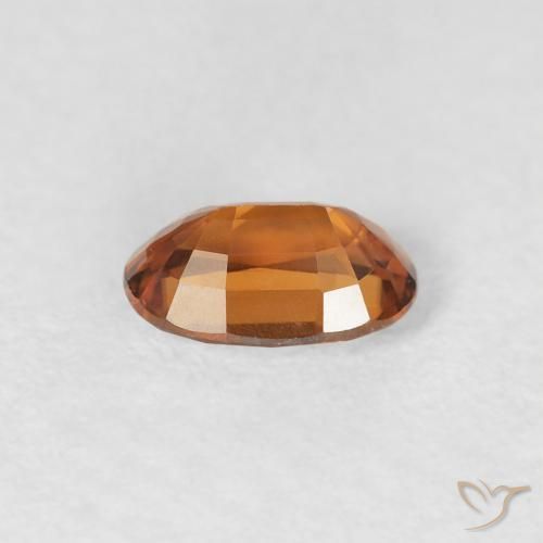 Zircon Orange foncé naturelle ovale, 0.72 ct, VS