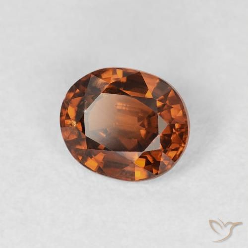 Zircon Orange brunâtre foncé naturelle ovale, 0.99 ct, VS