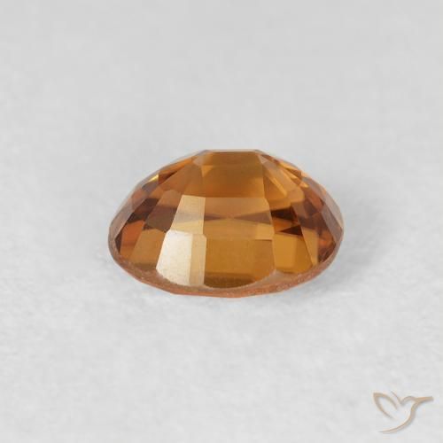 Zircon Orange brun naturelle ovale, 1.09 ct, VVS-VS