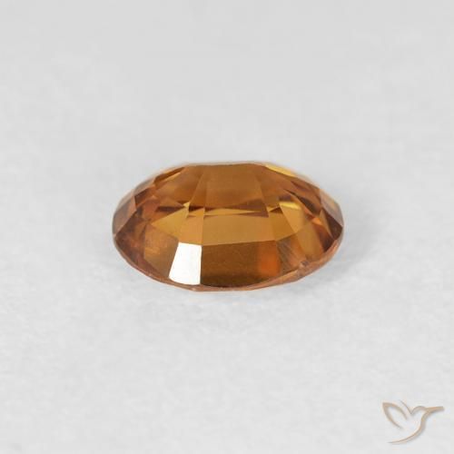 Zircon Orange terre naturelle ovale, 0.82 ct, VS