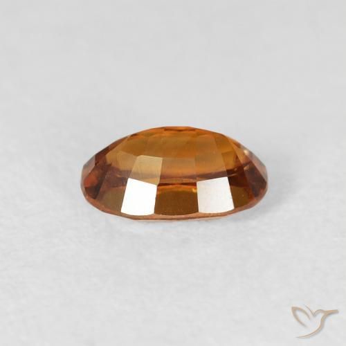 Zircon Medium Dark-Orange naturelle ovale, 0.80 ct, VS