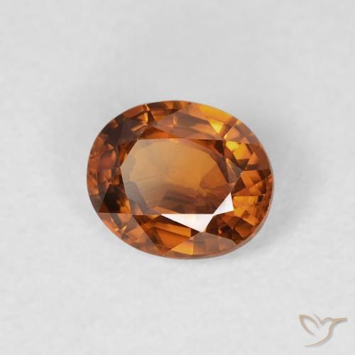 Zircon Orange foncé naturelle ovale, 0.88 ct, VS