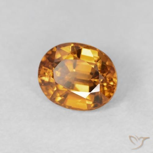 Zircon Orange foncé naturelle ovale, 1.09 ct, VS