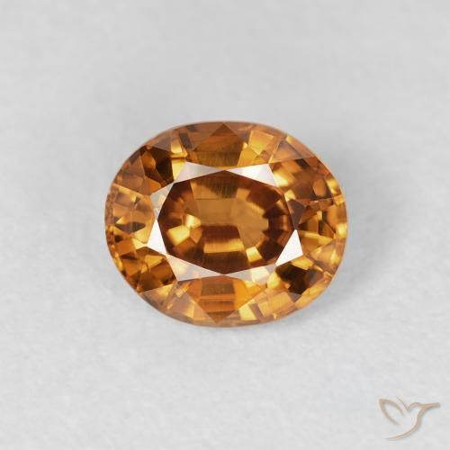 Zircon Orange rouille naturelle ovale, 1.03 ct, VS