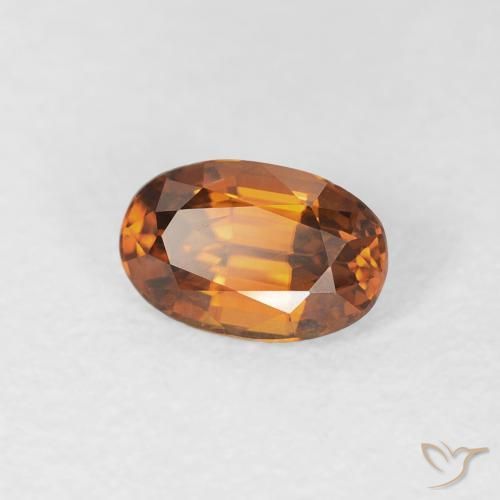 Zircon Orange foncé naturelle ovale, 0.77 ct, VVS