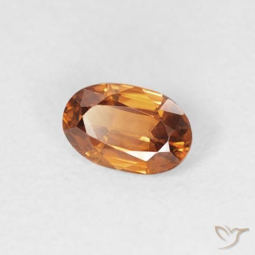 Zircon Orange foncé naturelle ovale, 0.64 ct, VVS