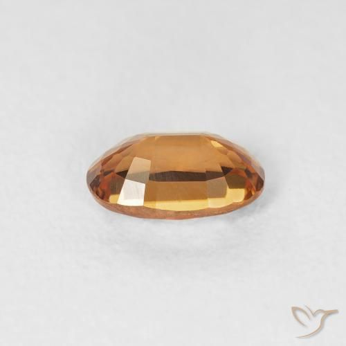 Zircon Orange foncé naturelle ovale, 0.68 ct, VVS