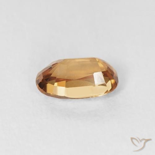 Zircon Orange rouille naturelle ovale, 0.76 ct, VVS