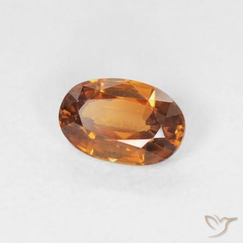 Zircon Orange foncé naturelle ovale, 0.68 ct, VVS