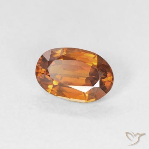 Zircon Orange brun naturelle ovale, 0.73 ct, VVS