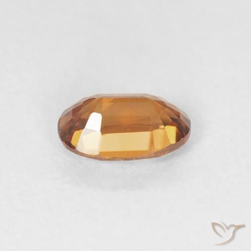 Zircon Orange brun naturelle ovale, 0.73 ct, VVS