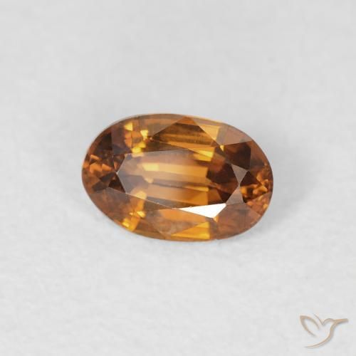 Zircon Orange brun naturelle ovale, 0.69 ct, VVS-VS