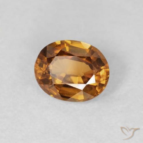Zircon Orange brun naturelle ovale, 0.85 ct, VVS-VS