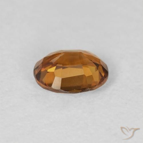 Zircon Orange brun naturelle ovale, 0.85 ct, VVS-VS