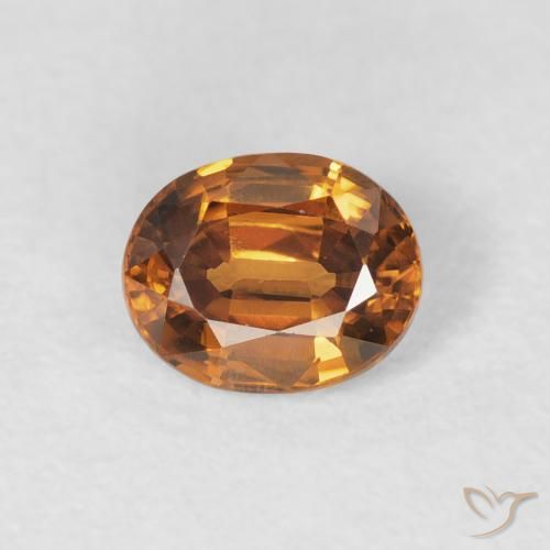 Zircon Orange brun naturelle ovale, 1.02 ct, VS