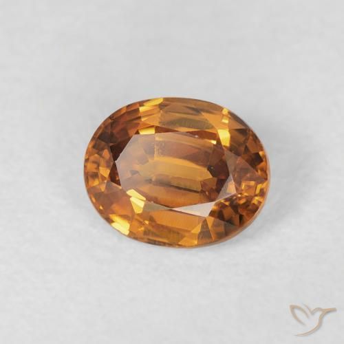 Zircon Orange brun naturelle ovale, 1.02 ct, VS