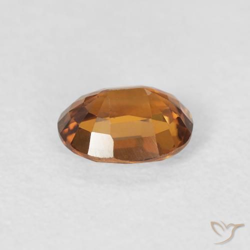 Zircon Orange brun naturelle ovale, 1.02 ct, VS