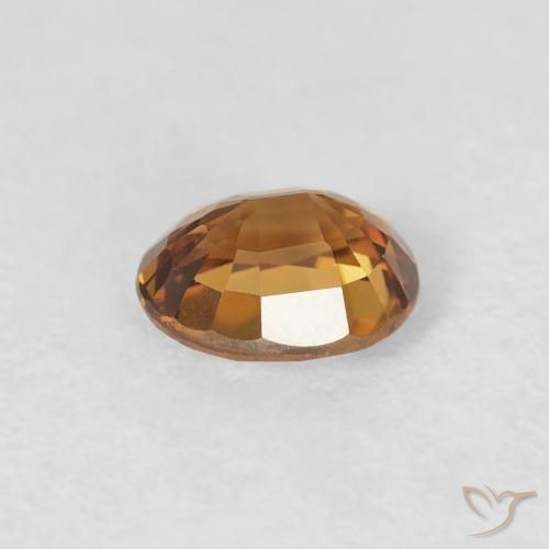 Zircon Orange brun naturelle ovale, 0.97 ct, VVS-VS